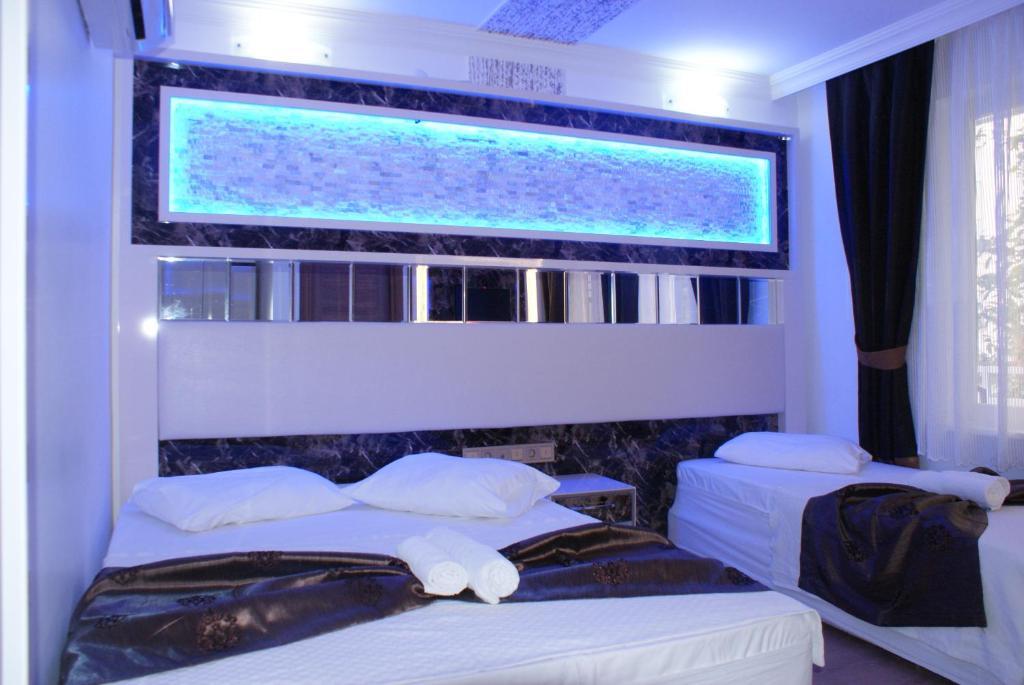 Behram Hotel Antalya Habitación foto
